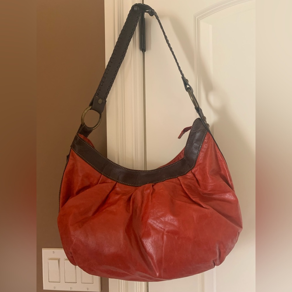 Orange and brown Leather bag.